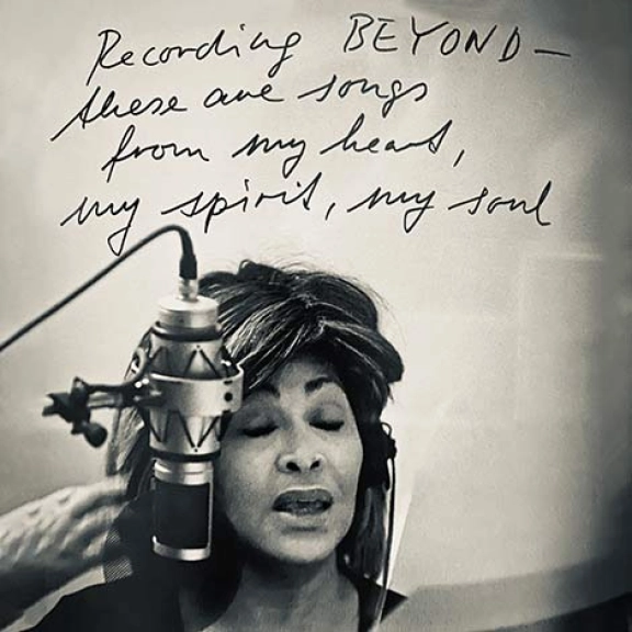 A printed picture of Tina Turner with her message on it