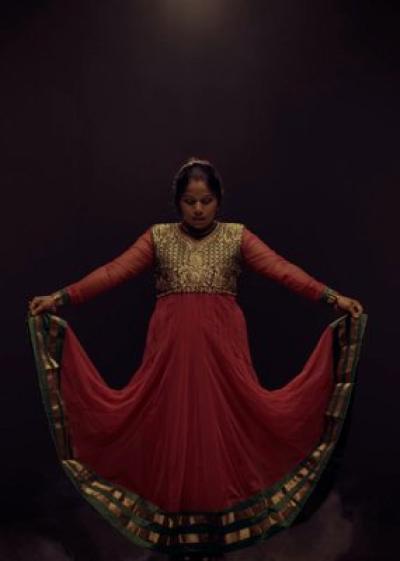 An artist in traditional clothing